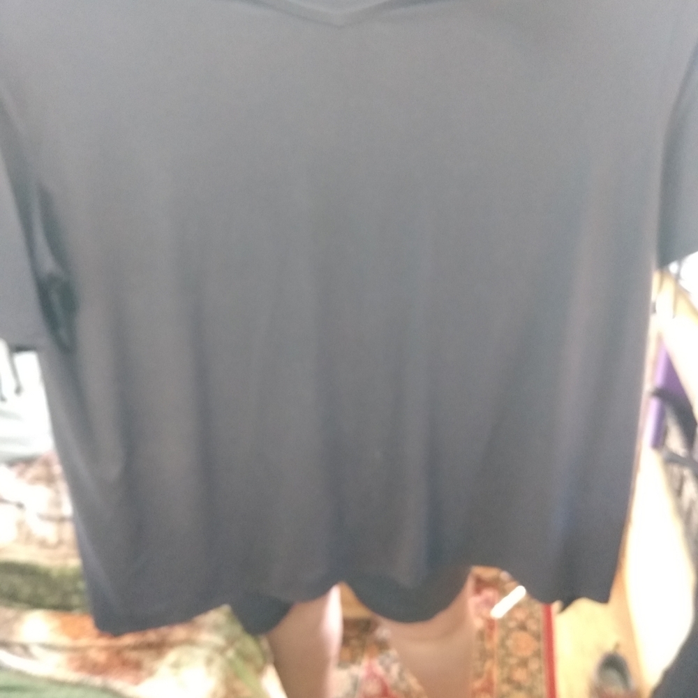 Women's black 3/4 sleeve shirt.